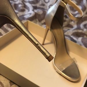 Gold and clear heels